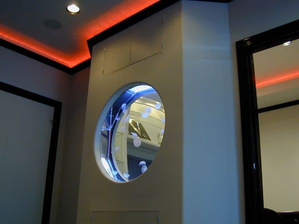 Custom jellyfish aquarium built into a wall